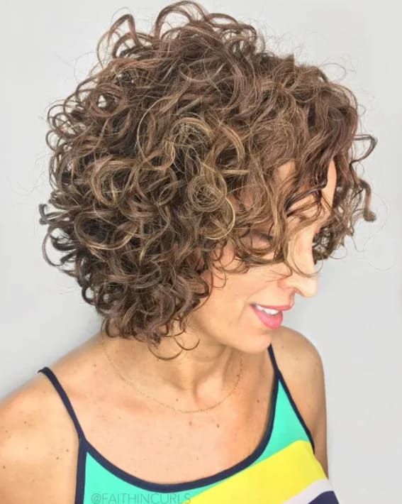 Medium-length Curly Bob with Bangs