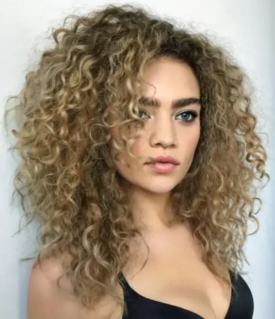 Medium Layered Curly Bronde Hairstyle