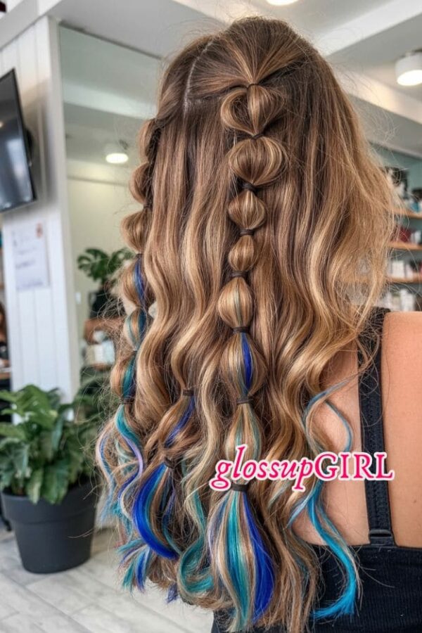 Long wavy hair with a heart-shaped half-up style, bubble braid, and blue peekaboo streaks.