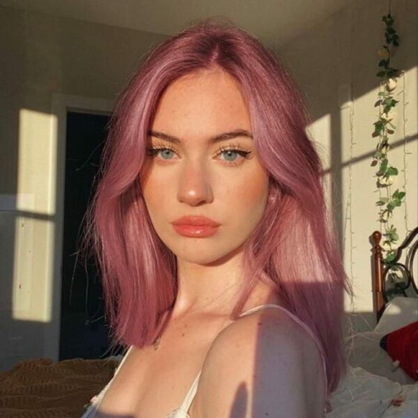 Light lavender-pink hair with a soft, natural wave and subtle shine.