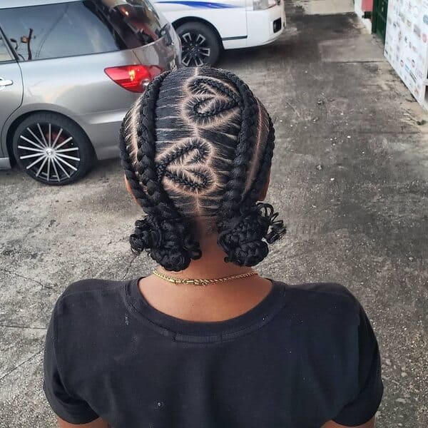 Heart-shaped cornrows paired with low Buns