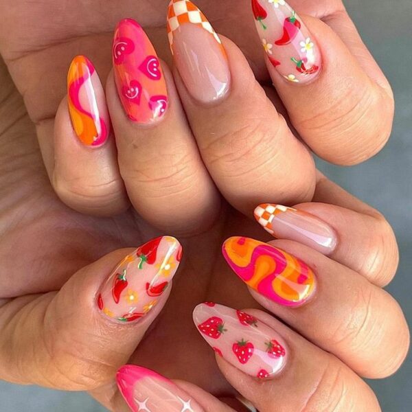 Colorful almond nails with strawberries, cherries, hearts, florals, and vibrant retro swirls.