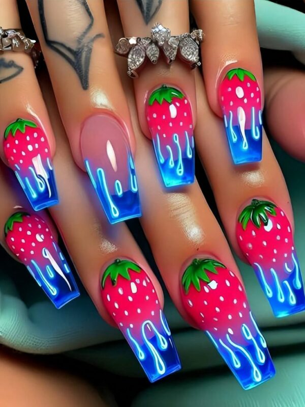 Long coffin nails with pink strawberries and neon blue drip accents on a glossy base.
