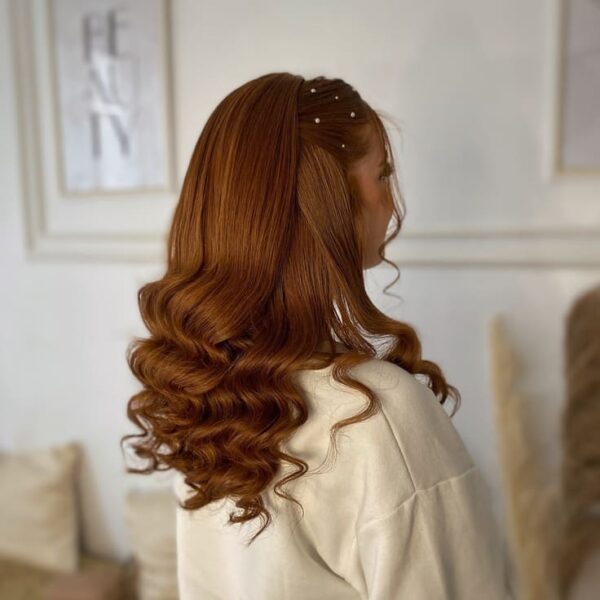 Smooth copper waves with pearl hair accents and vintage styling