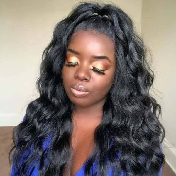 Long wavy black hair in a high half-up ponytail with natural volume